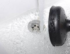 How to unclog a bathtub drain with standing water