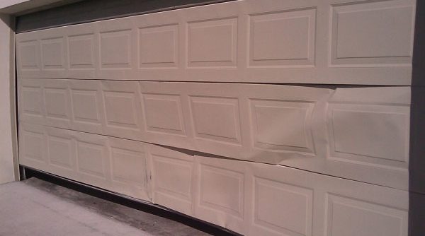 How to Fix Garage Door Dent With Hot Water?