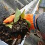 How do you clean garden gutters?