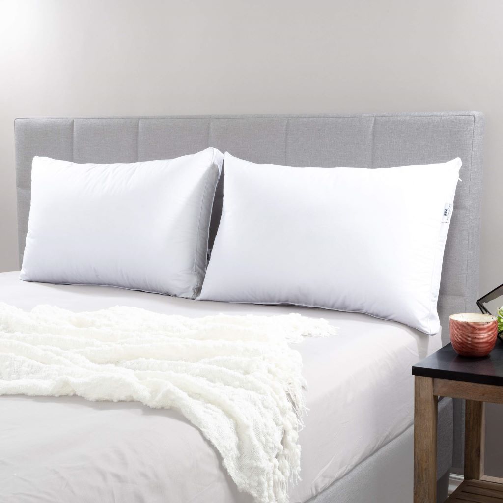 Luxury-feel budget-friendly bed pillows arranged on a neatly made bed.